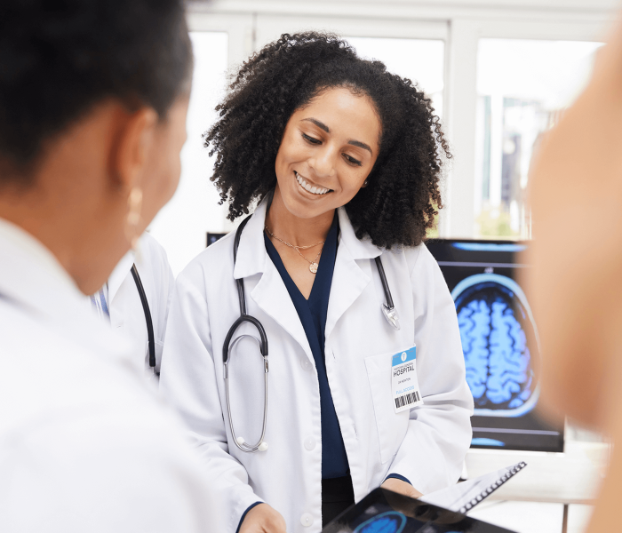 woman doctor with tablet and MRI brain scan imaging